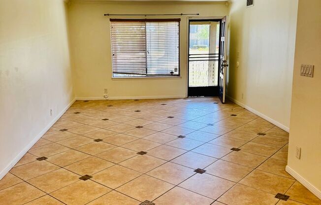 2/1 Townhome with 2 car attached garage & AC for Rent in La Palma!