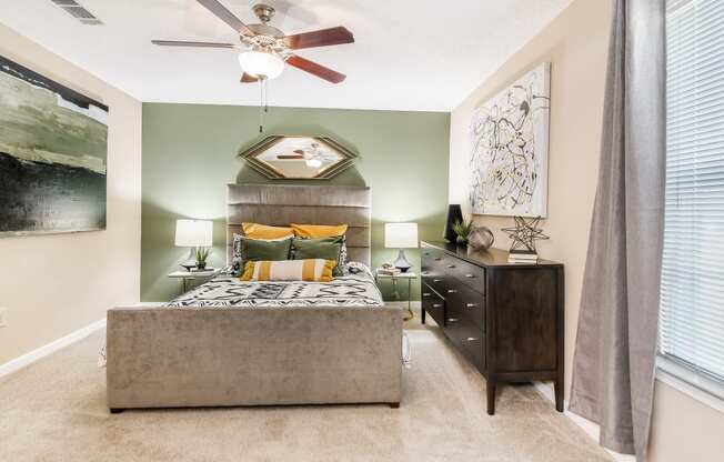 a bedroom with a bed at Crossgates Apartment Homes, Starkville, MS 39759