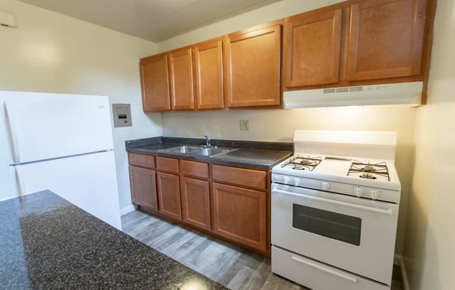 This is a photo of the kitchen of the 550 square foot 1 bedroom, 1 bath patio apartment at College Woods Apartments in the North College Hill neighborhood of Cincinnati, OH.