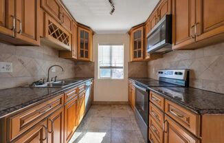 Must see 2 bedroom condo with A/C & community pool!