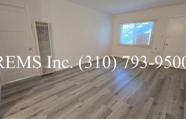 Remodeled 1 Bedroom Upstairs Apartment w/ Garage Parking