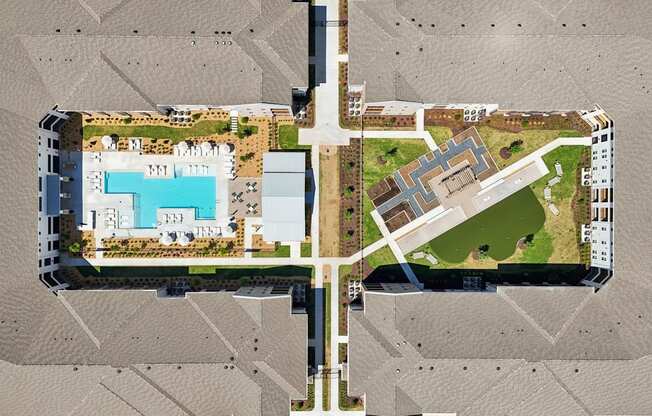 An aerial view of the community: pool , community garden, hammocks, mini golf, bocce, and corn hole