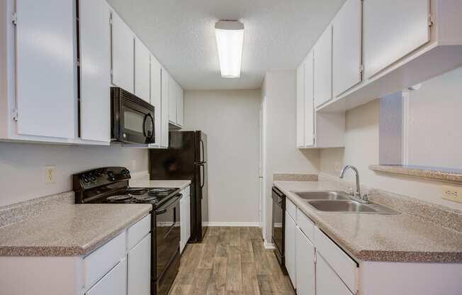 Model Kitchen at Bookstone and Terrace Apartments in Irving, Texas