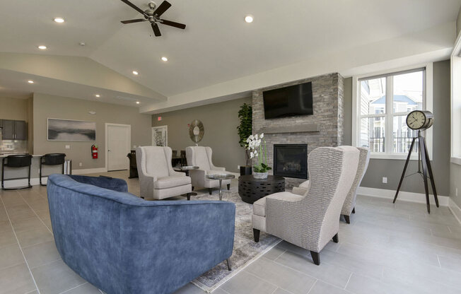 Community building with fireplace wall at Dodson Pointe Apartment Homes in Rogers, AR