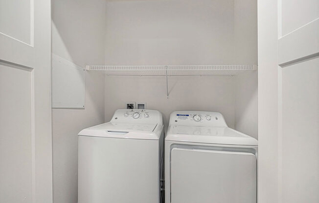 laundry room with washer and a dryer at Trade Winds Apartment Homes, Elkhorn, NE