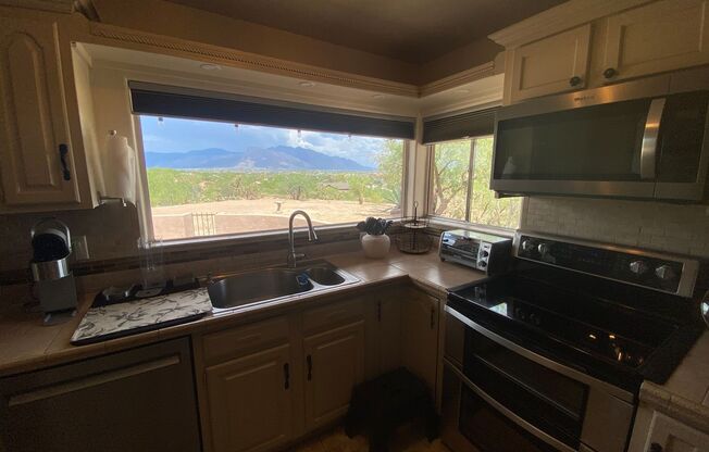 3 Bedroom 2 Bath perched on a scenic overlook with sweeping views of the Tucson Valley and city lights