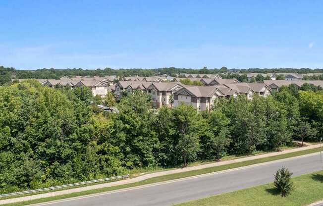 A suburban neighborhood with houses and trees.