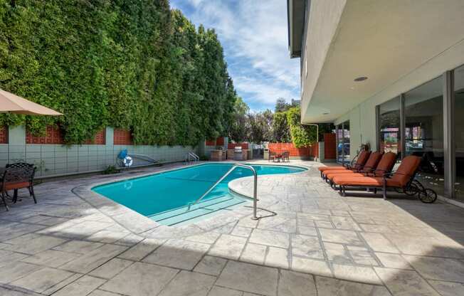 Apartments for Rent in Encino - White Oak Terrace Swimming Pool with Lounge Chair Seating and BBQ Grilling Area