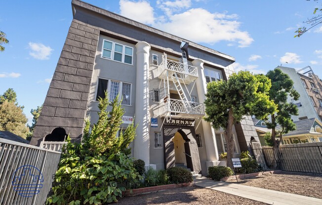 the exterior of a building with a staircase on the side