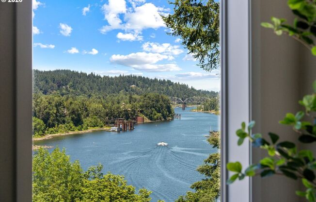 Luxury Lake Oswego 3-Bedroom Riverfront Condo with Panoramic River Views, Pools & Fitness Center