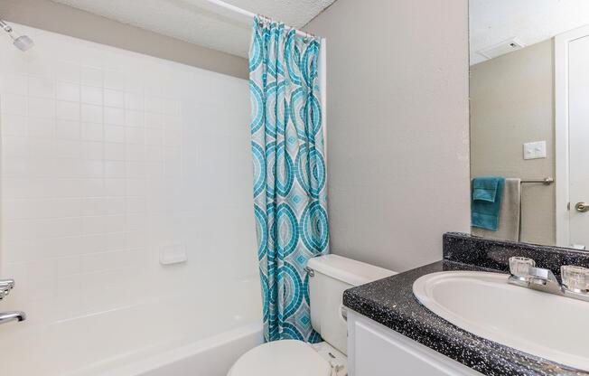 A FULL BATHROOM WITH TUB FOR SOAKING