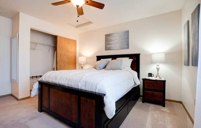 Bedroom With Ceiling Fan & Sliding Closet Door