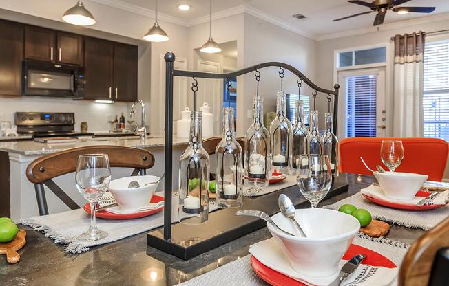 a kitchen with a blender on a table