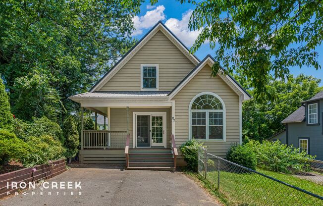 Charming Three-Bedroom Home with Solar Power and Fenced Yard in Asheville