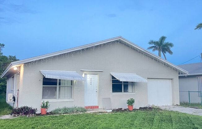 No HOA Fees!  Great location 4 bedroom house in Boca Raton!  Free Internet!