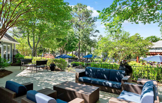 Patio with seating at Creekside at White Oak