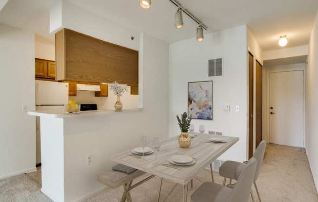 Malva Dining Area with Kitchen View at Northport Apartments, Michigan