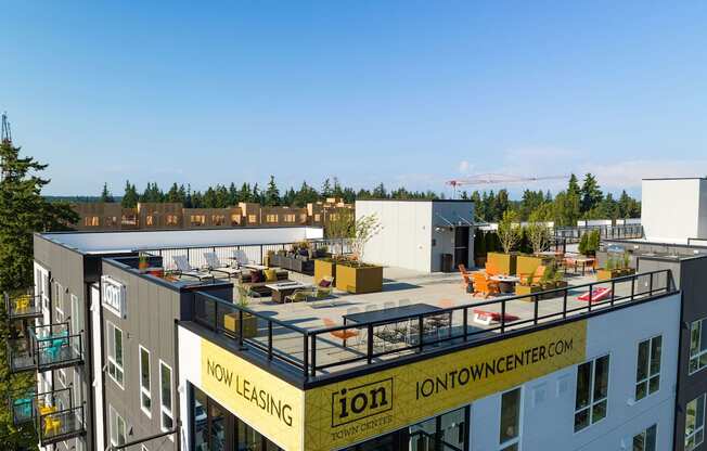 a view from the top of a building of a construction site with a crane in the background at Ion Town Center, Washington