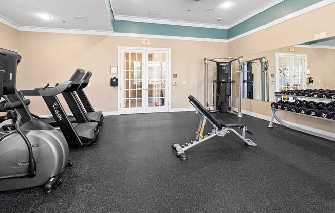 the gym at the heights at harpers preserve apartments