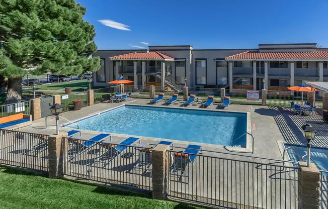 a pool next to a fence