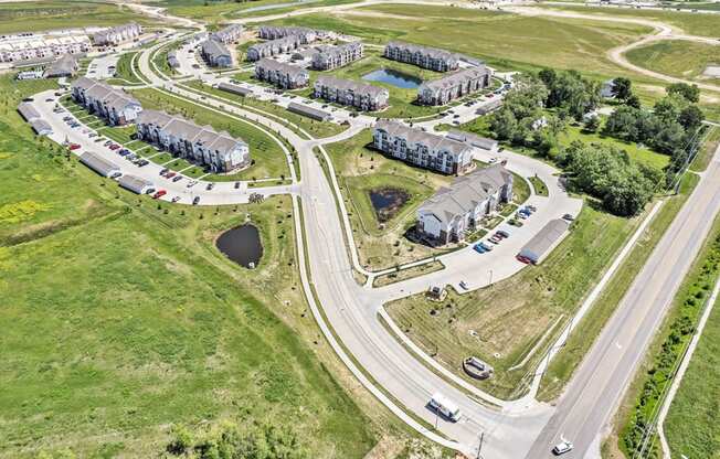 an aerial view of an apartment community at Trade Winds Apartment Homes in Elkhorn, NE 68022