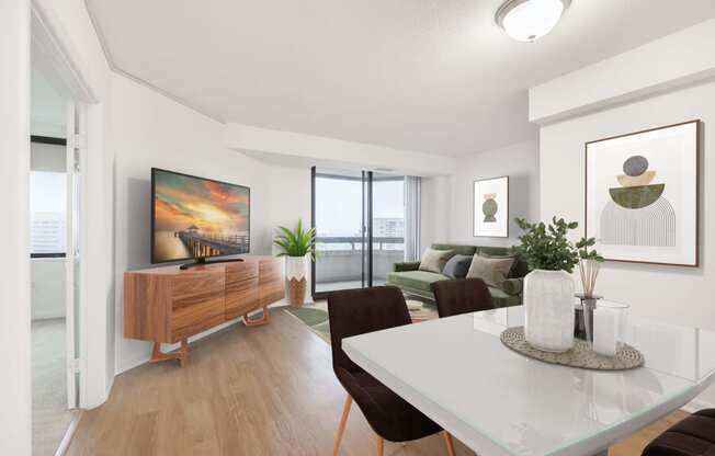 a living room and dining room with a white table