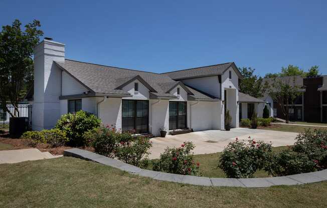 a white house with a gray roof