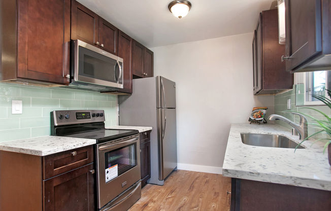This is a must see!   With AC! and Pvt Patio(Downstairs Unit) EV Chargers!