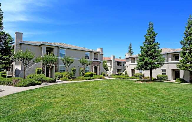 Welcome to Ascent at the Galleria—where lush lawns, charming paths, and modern comfort meet in a serene Roseville setting.