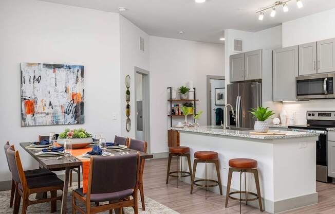 Rhythm High-End Kitchen with Granite Counters and Stainless Steel Appliances