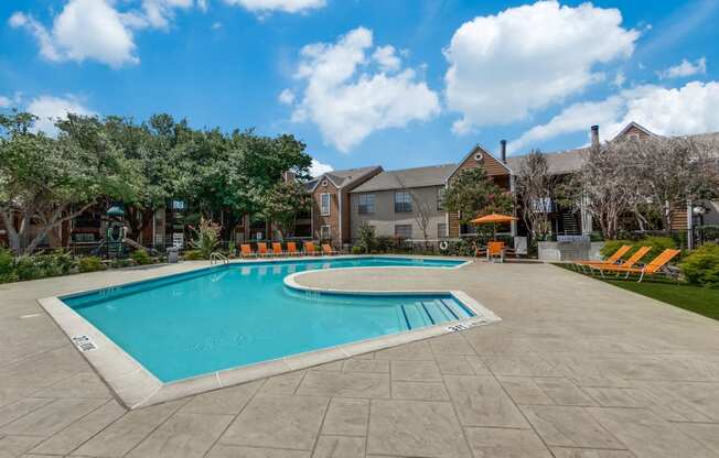 the preserve at ballantyne commons pool and spa with apartment buildings