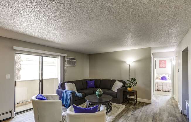 a living room with a couch and a table