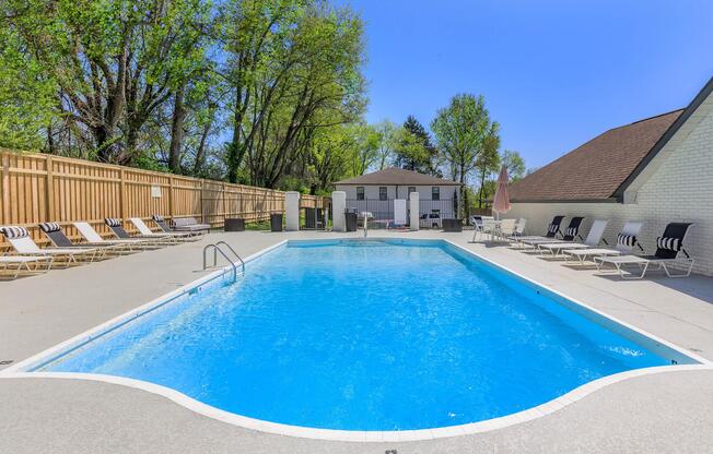 The Roosevelt Apartment Home apartments' in Murfreesboro, Tennessee shimmering swimming pool.