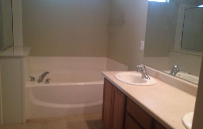 3 Bed/2.5 bath. All Tile Downstairs. Open Great Room floor plan.