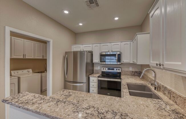 55 plus community. Gorgeous Remodeled Stunner! This charming Twin Home boasts high ceilings & lots of natural light! 2 Bedroom / 2 Bath, tile throughout!!  All appliances included.  Available October 1st.