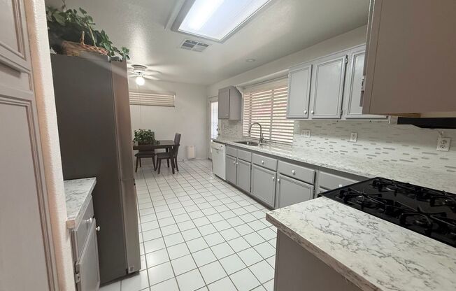Spacious 4-Bedroom Home with 3-Car Garage in Orchards of Las Vegas