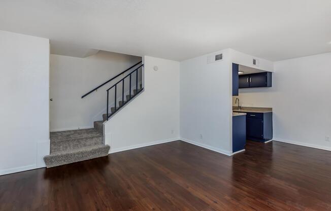 a kitchen with a wood floor