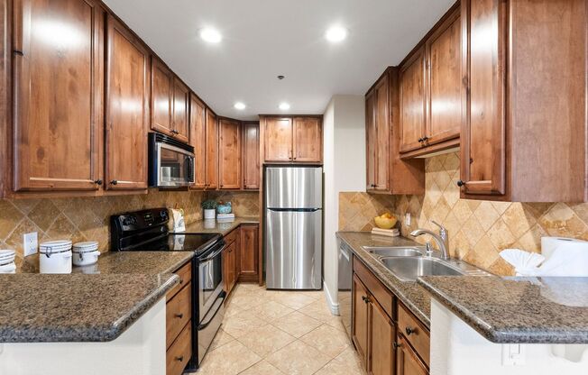 Bright and Spacious 2-Bedroom Condo with Water/Trash Included!