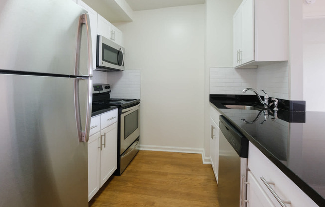 Kitchen with Stainless Steel Appliances and Hard Surface Flooring