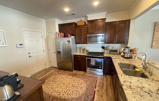 Like new 3 Bedroom townhouse with 2 car garage