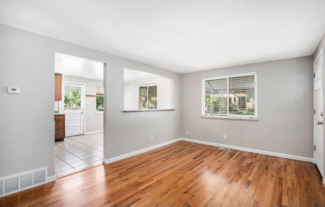 Spacious 4BR with bonus space and a 2 car garage in the heart of Sunnyside!