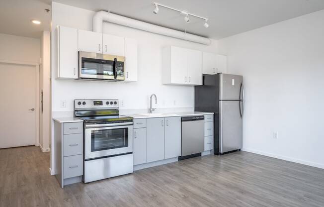 The Lenox | Kitchen Area with Stainless Steal Appliances