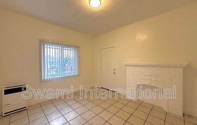 932 W 62 ST