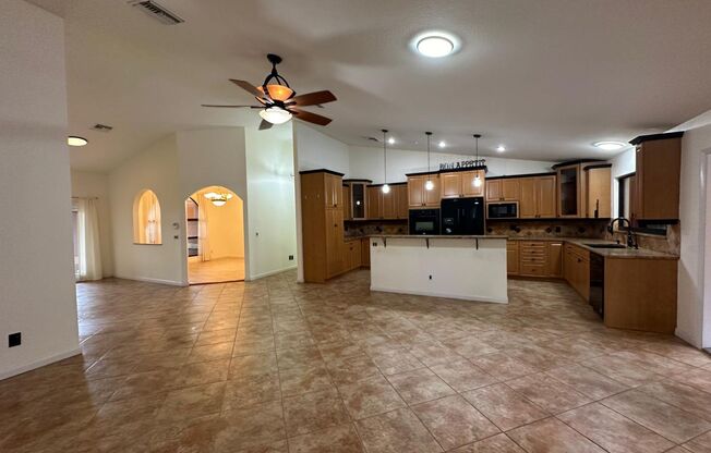 Tranquil Lakefront Living in the Heart of Port St. Lucie with Pool!