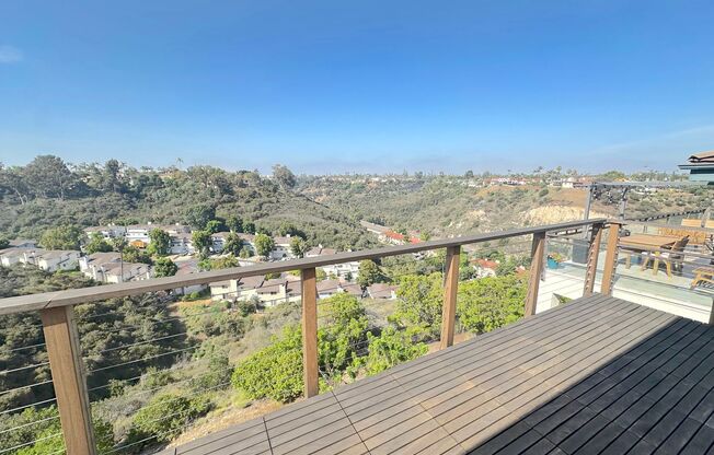 Stunning Hillside Home with Expansive Views and Modern Comforts