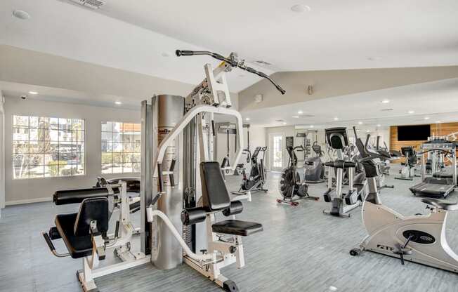 the gym at the enclave at woodbridge apartments in sugar land, tx