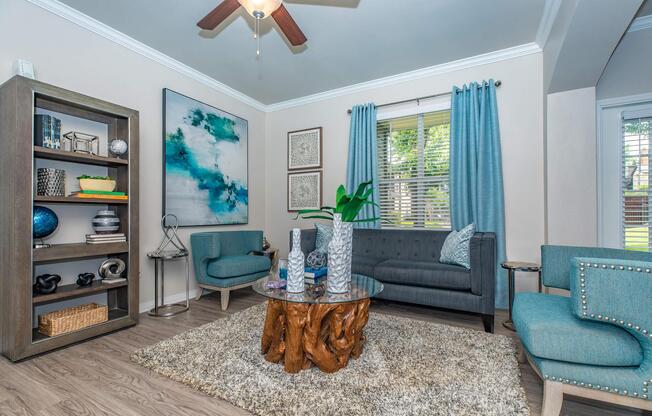 a living room filled with furniture and a fire place