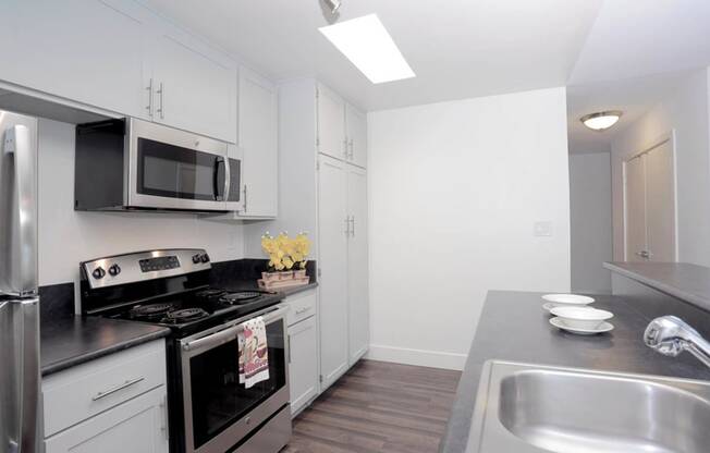 Kitchen area with appliances and cabinets1 at Waverly, California, 90039