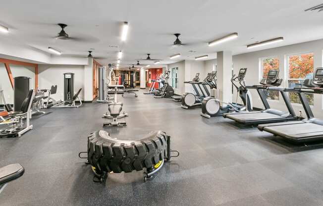 the gym with treadmills and other exercise equipment at the belgard apartments