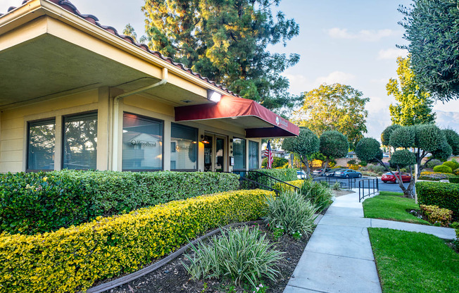 Leasing office entrance at Woodbend, Alta Loma, California